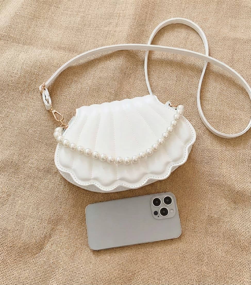Bolso bandolera con diseño de concha